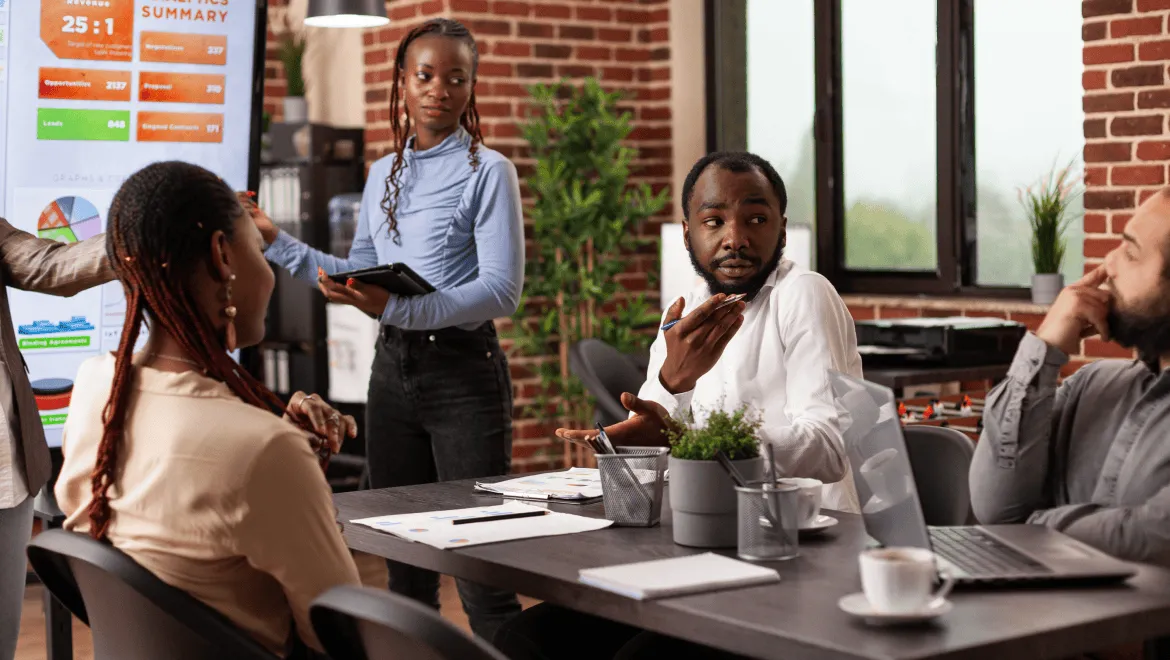 businesswoman-explaining-management-strategy-showi-2021-12-16-00-18-13-utc 1